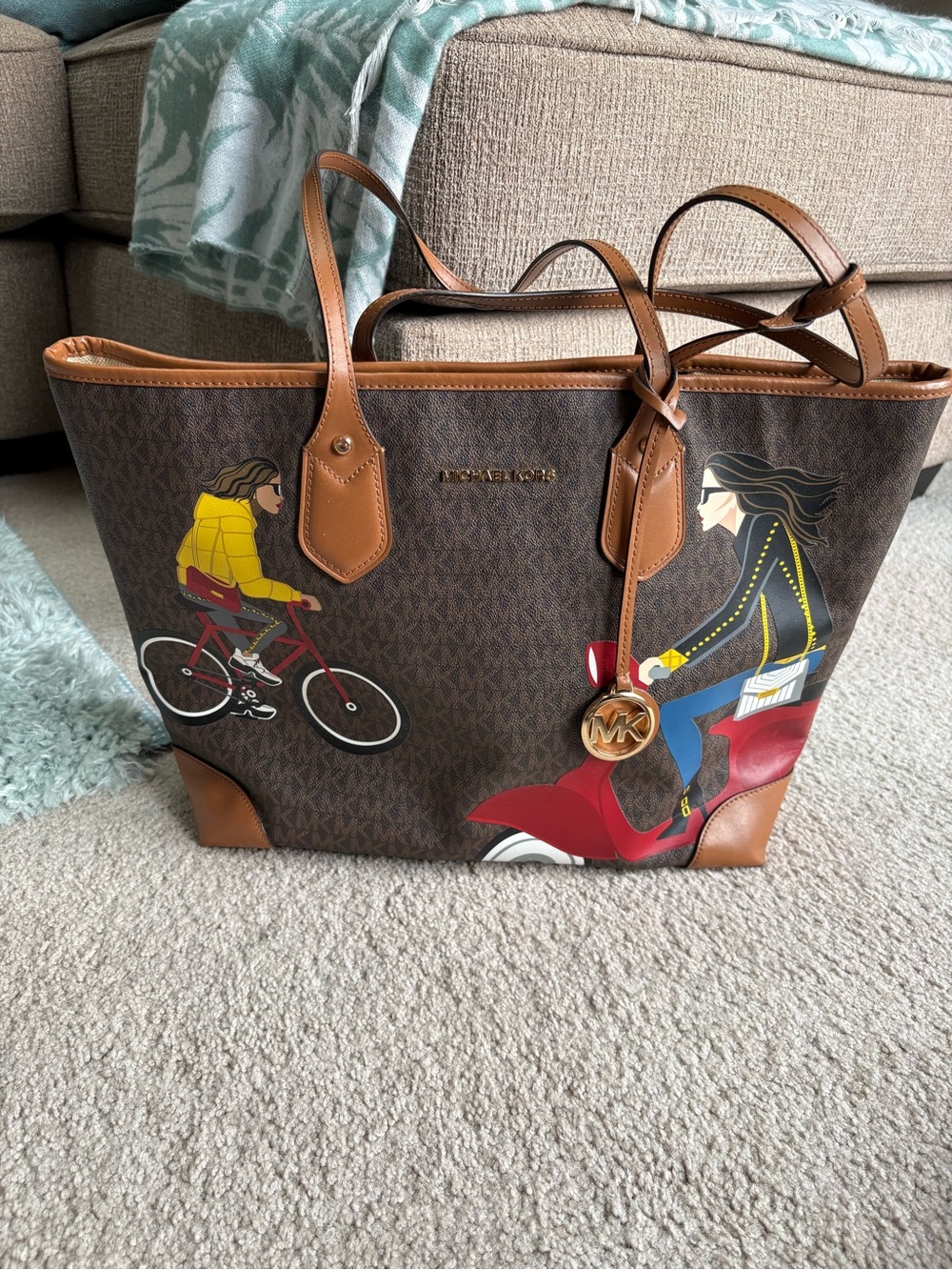 Michael Kors Brown Printed Signature Tote with Riders